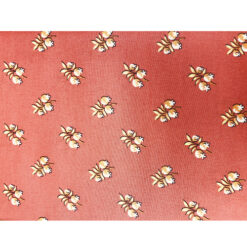 Tela DV 128  fondo naranja con flores, 100% algodón, 1.10  mt. ancho x 30 cm