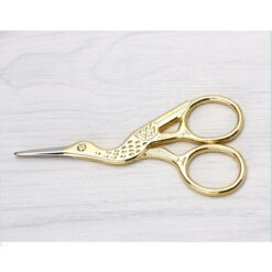 Tijera 008 figura pelicano color dorada mide 11,5 cm