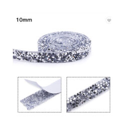 Cinta 46 con brillos plateado con adhesivo  mide 10mm ancho x 91cm de largo