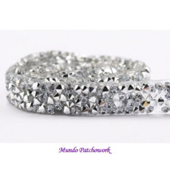 Cinta 57 con brillos plateado sin adhesivo  mide 20mm ancho x 91cm de largo