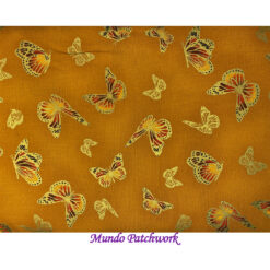 100% algodón, fondo naranja, diseño mariposas con dorado