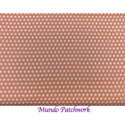 100% algodón, fondo rosado, puntos blancos
